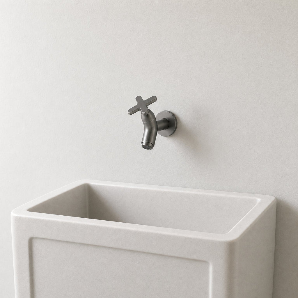 Wall Mounted Cold Water Tap, Solid Brass Single Faucet for Utility & Garden Sinks mounted above a compact utility sink, showing its size