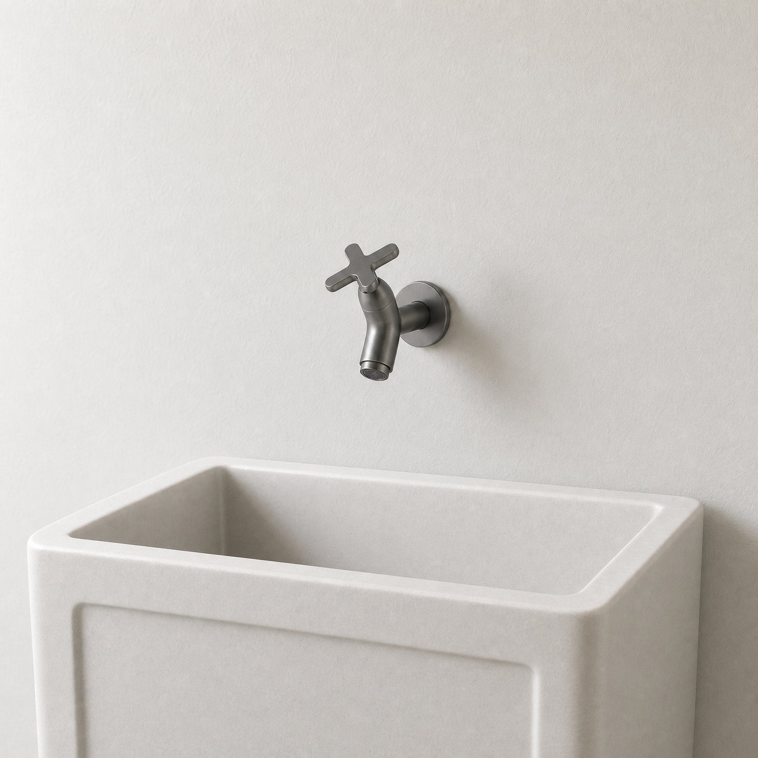 Wall Mounted Cold Water Tap, Solid Brass Single Faucet for Utility & Garden Sinks mounted above a compact utility sink, showing its size