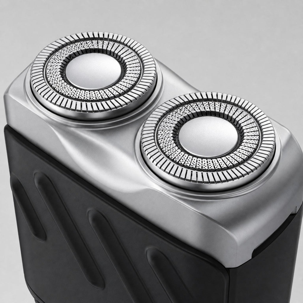 Rotary Electric Shaver for Men, Dual-Ring Blade Water-Resistant Grooming Razor, close-up of the dual rotary cutting heads