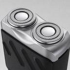 Rotary Electric Shaver for Men, Dual-Ring Blade Water-Resistant Grooming Razor, close-up of the dual rotary cutting heads