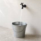 Wall Mounted Cold Water Tap, Solid Brass Single Faucet for Utility & Garden Sinks running, filling a galvanised bucket below