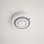 Smart WiFi Smoke & Fire Alarm, 85dB Heat Detection Alert with App Notifications, mounted on a plain ceiling
