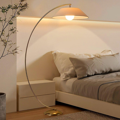Modern floor lamp flowing arc design studio view