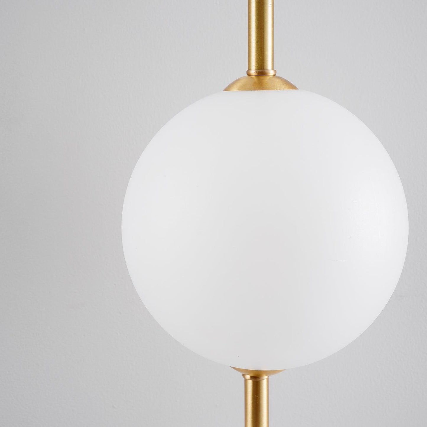 Modern Wall Light | Vertical Glass Globe | Ridorn