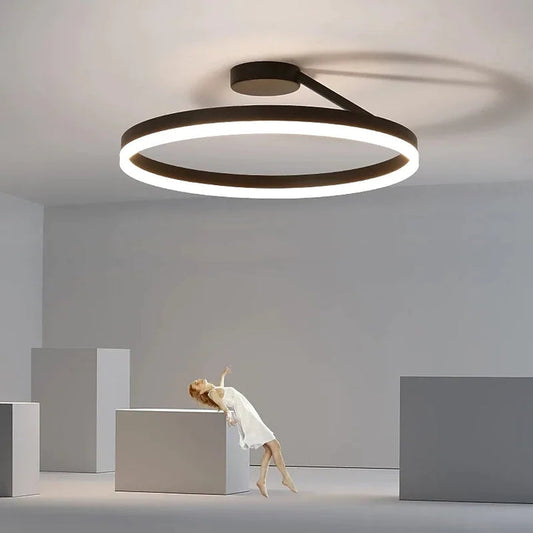 Modern offset circular LED ceiling light by Ridorn