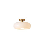 Elegant Round Amber Glass Ceiling Light for Modern Spaces | Ridorn