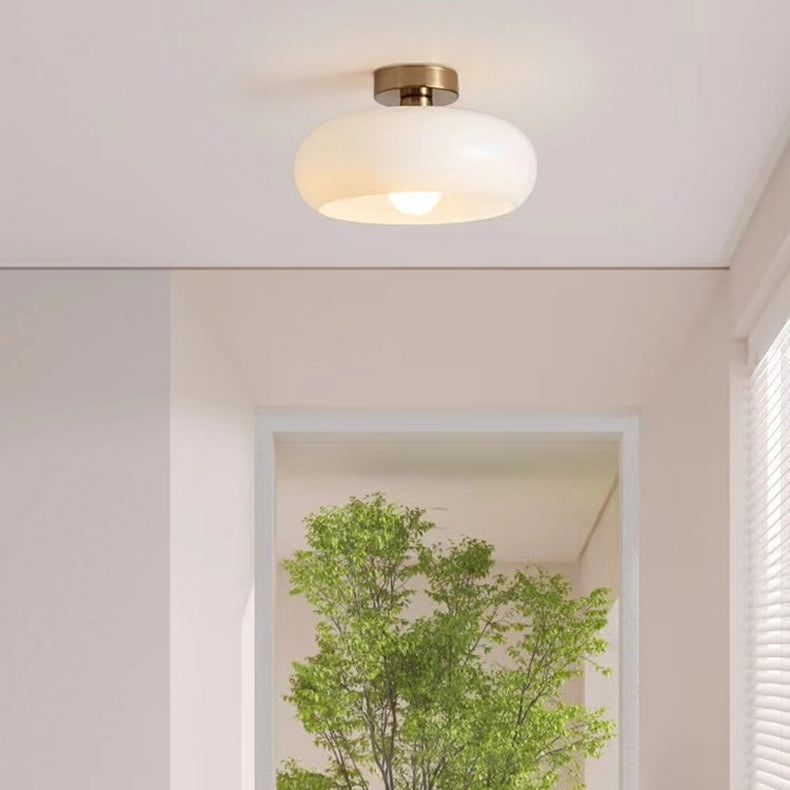 Elegant Round Amber Glass Ceiling Light for Modern Spaces | Ridorn