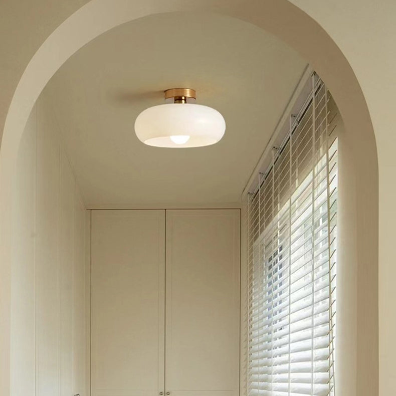 Elegant Round Amber Glass Ceiling Light for Modern Spaces | Ridorn