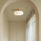 Elegant Round Amber Glass Ceiling Light for Modern Spaces | Ridorn