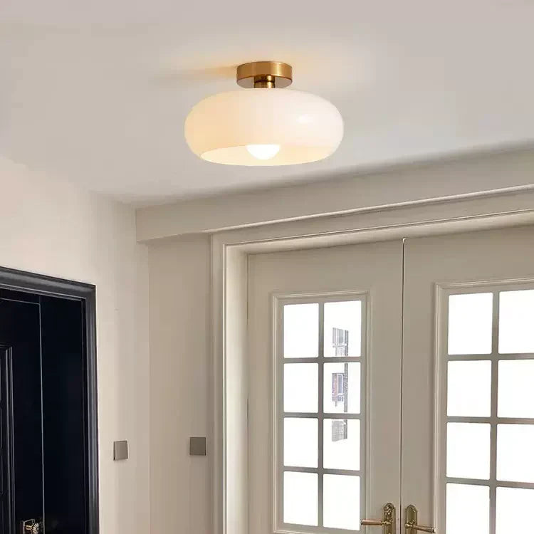Elegant Round Amber Glass Ceiling Light for Modern Spaces | Ridorn