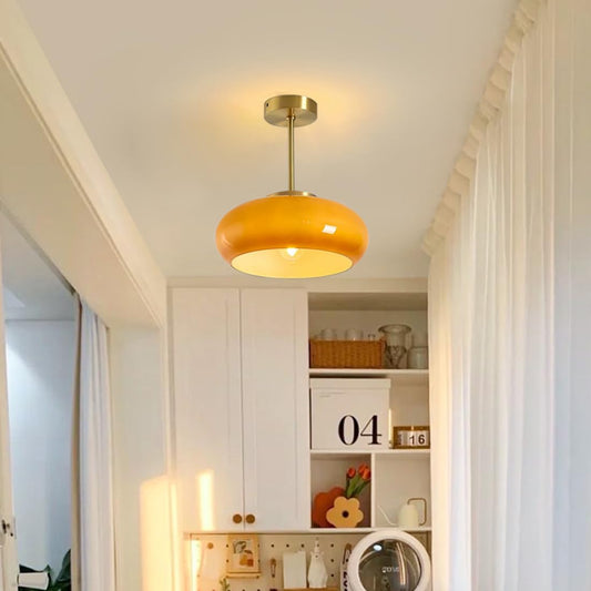 Elegant round amber glass ceiling light for modern interiors