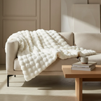 Cozy faux-fur throw blanket soft texture studio view