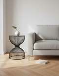 Modern black side table hourglass shape front view