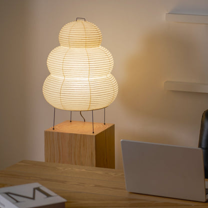 Indoor table lamp layered paper tiered shade front view